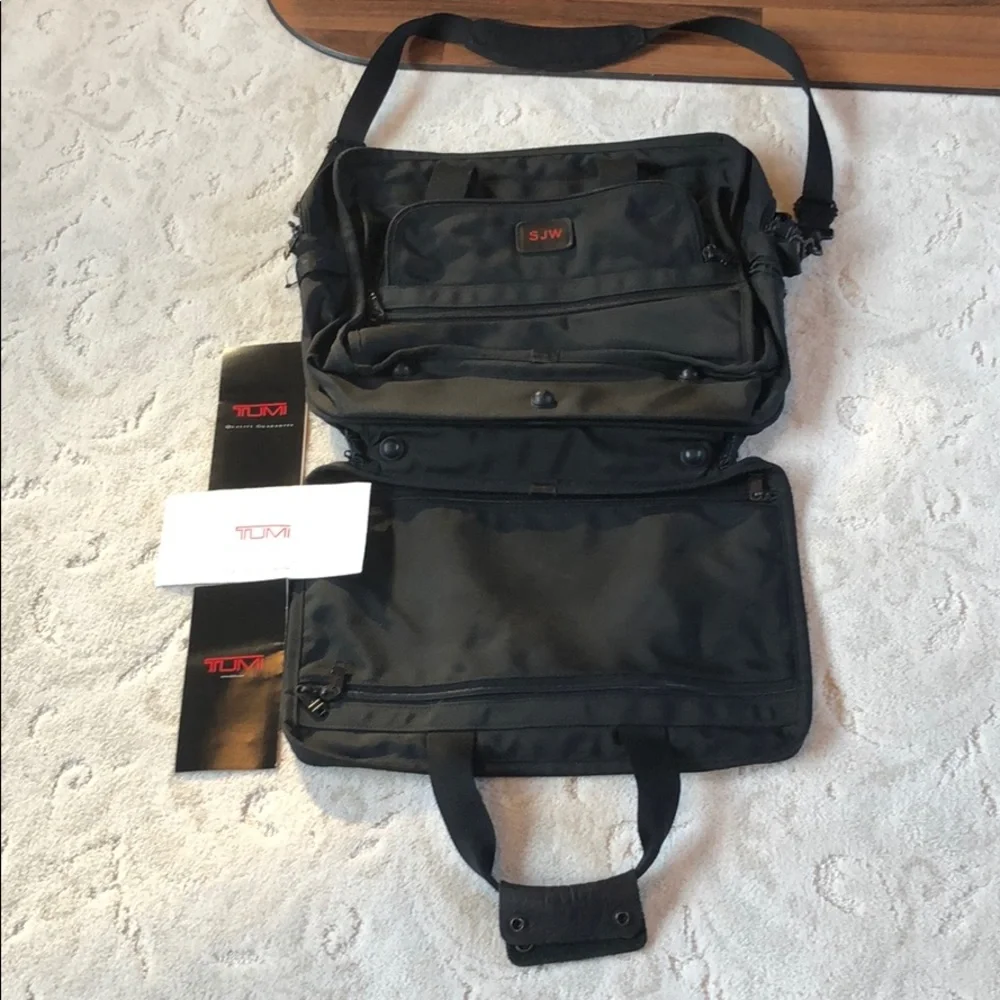 Tumi expandable crossbody suitcase/briefcase